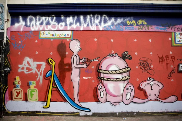 Gente de graffiti - carril del ladrillo. — Foto de Stock