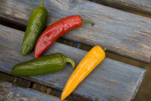 Yellow, green, red  traffic light chili pepper — Stock Photo, Image