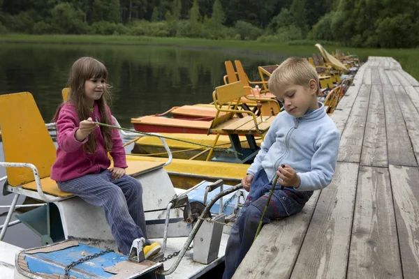 Children playing in  boat. — Stock Photo, Image