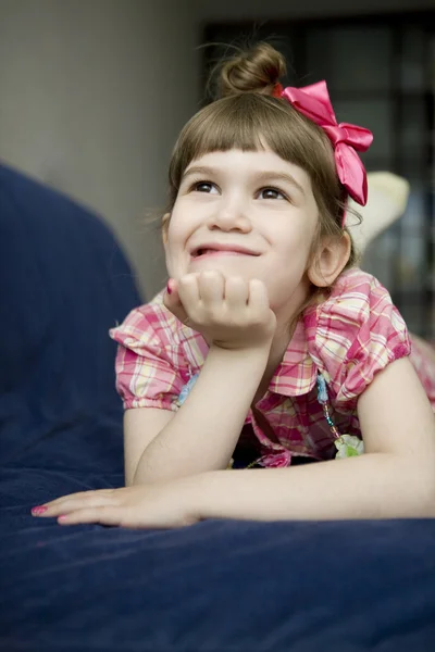 Girl lying on her belly — Stock Photo, Image