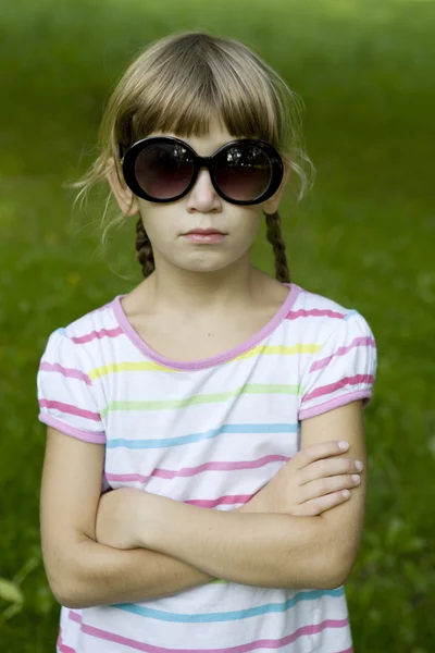 Little cute girl playing spy — Stock Photo, Image