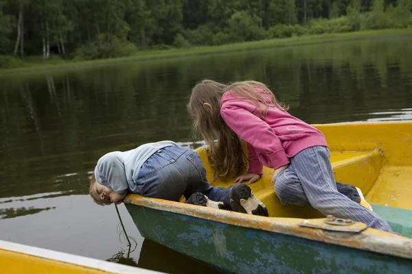 Children playing in  boat. — Stock Photo, Image