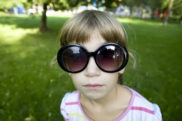 Little cute girl playing spy — Stock Photo, Image