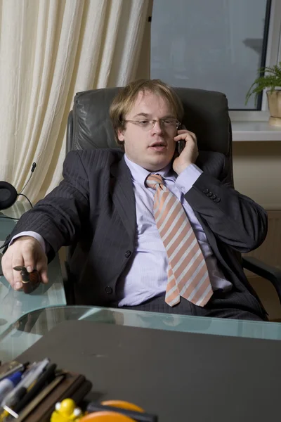 Tired boss sitting on chair. — Stock Photo, Image