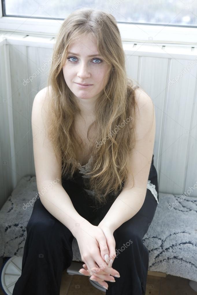 Cheeky Blond Teenager Looking At The Camera Stock Photo Cheeky Blond Teenager Looking At The Camera Stock Photo