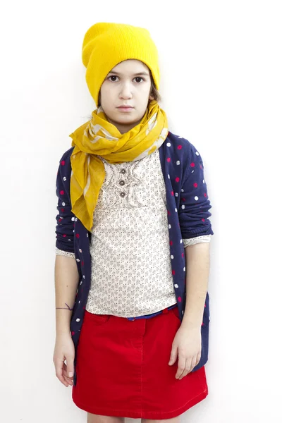 Girl wearing knitting ginger hat with pompom — Stock Photo, Image