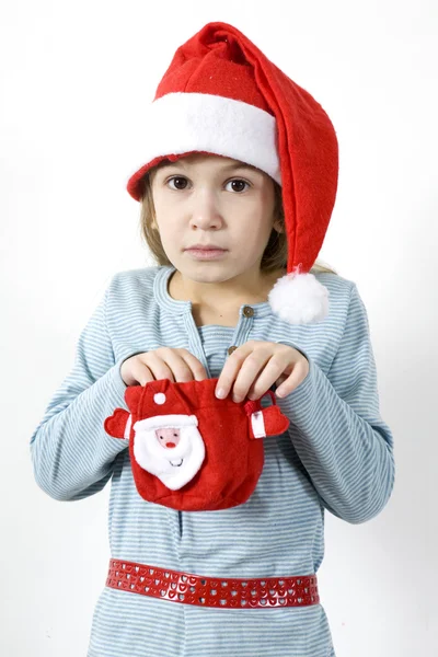 Noel Baba'nın kırmızı şapkalı kız — Stok fotoğraf