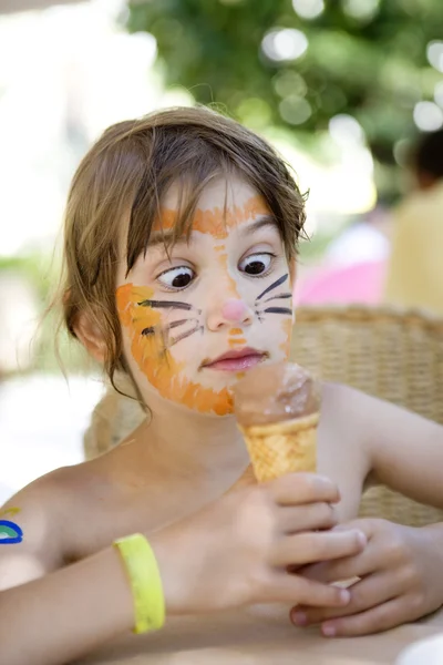 Little cute girl with painting face — Stock Photo, Image