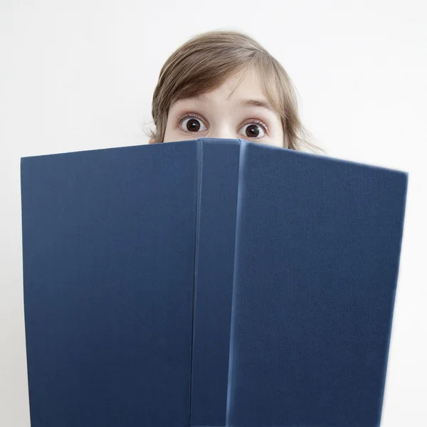 Cute little girl reading a book — Stock Photo, Image