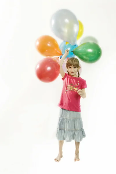 Young happy girl with colour balloons — Stockfoto