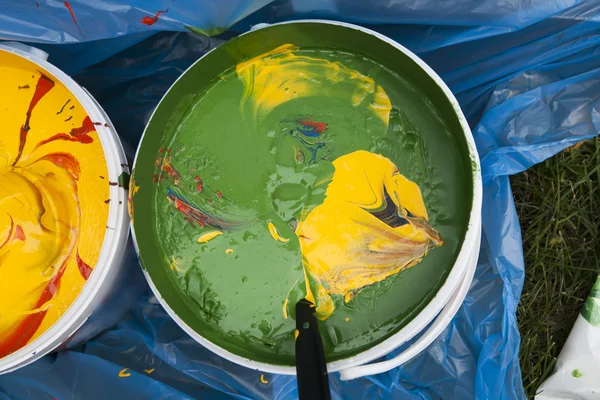Paint buckets with colors — Stock Photo, Image