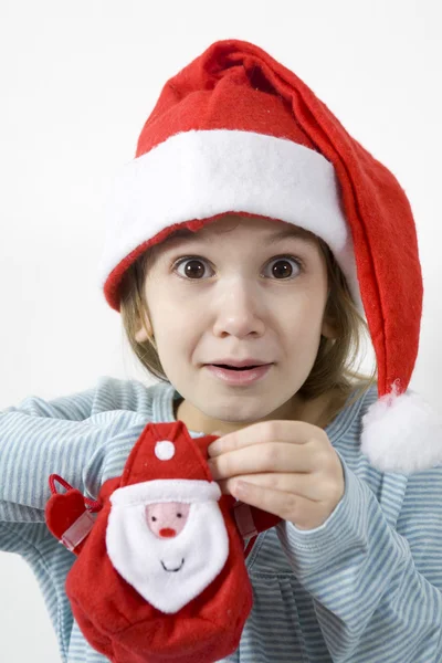 Noel Baba'nın kırmızı şapkalı kız — Stok fotoğraf