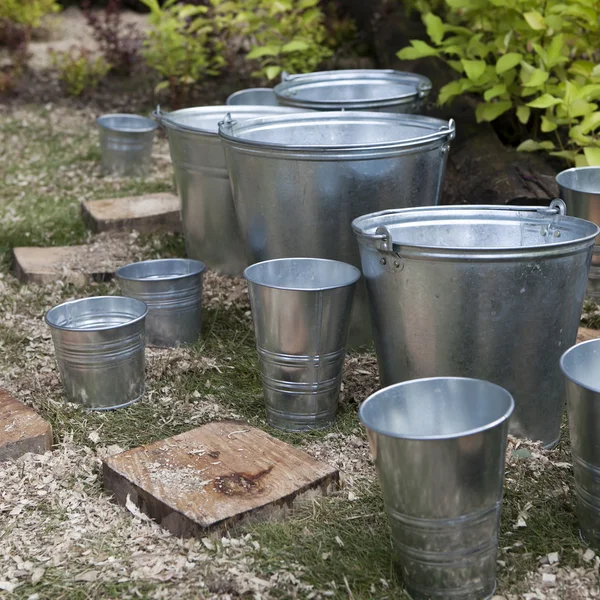 Zinc bucket of water standing — Stock Photo, Image