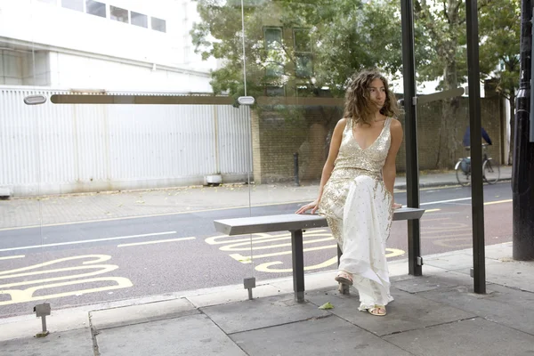 Woman on bus stop — Stock Photo, Image