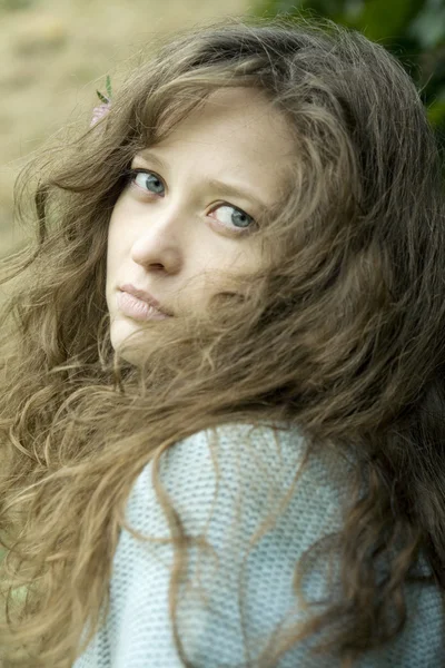 Portrait of young woman with worried look — Stock Photo, Image