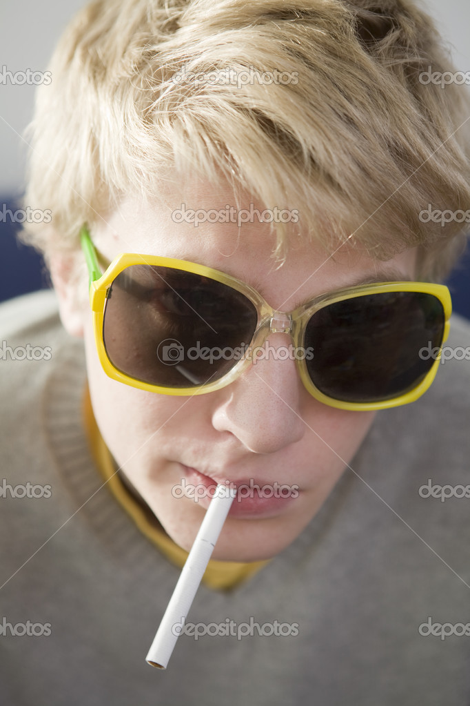 Blond funny man smoking cigarette Stock Photo by ©elenarostunova 45384213 Blond funny man smoking cigarette Stock Photo by ©elenarostunova 45384213