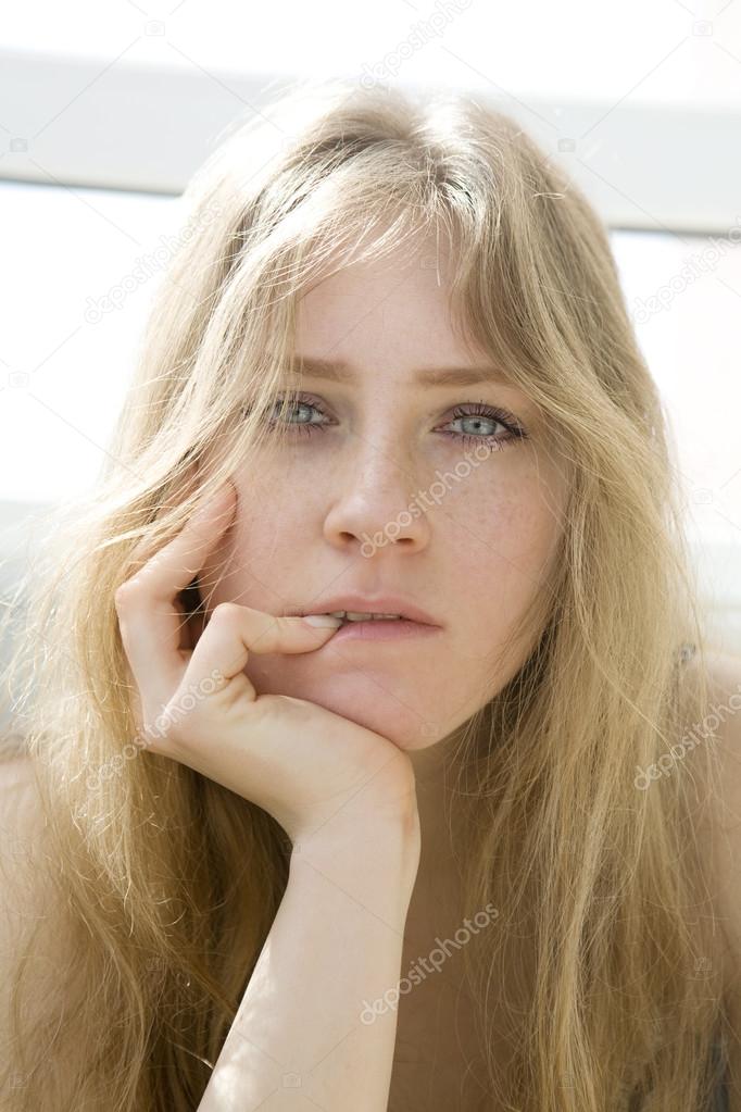 Cheeky Blond Teenager Looking At The Camera Stock Photo Cheeky Blond Teenager Looking At The Camera Stock Photo