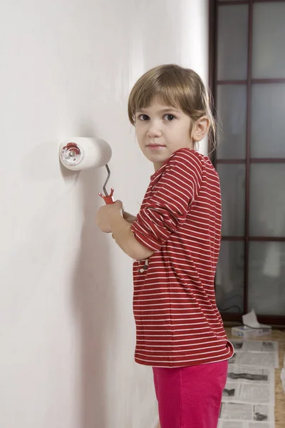 Young girl with paint-brush. — Stock Photo, Image