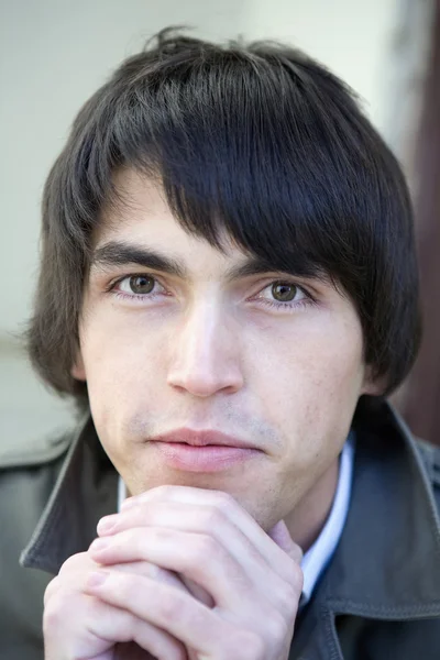 Close up portrait of young serious handsome man. Royalty Free Stock Photos