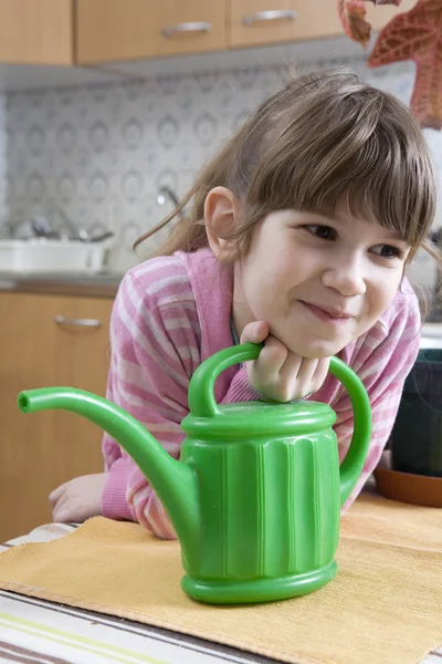 Girl with watering-can — Stock Photo, Image