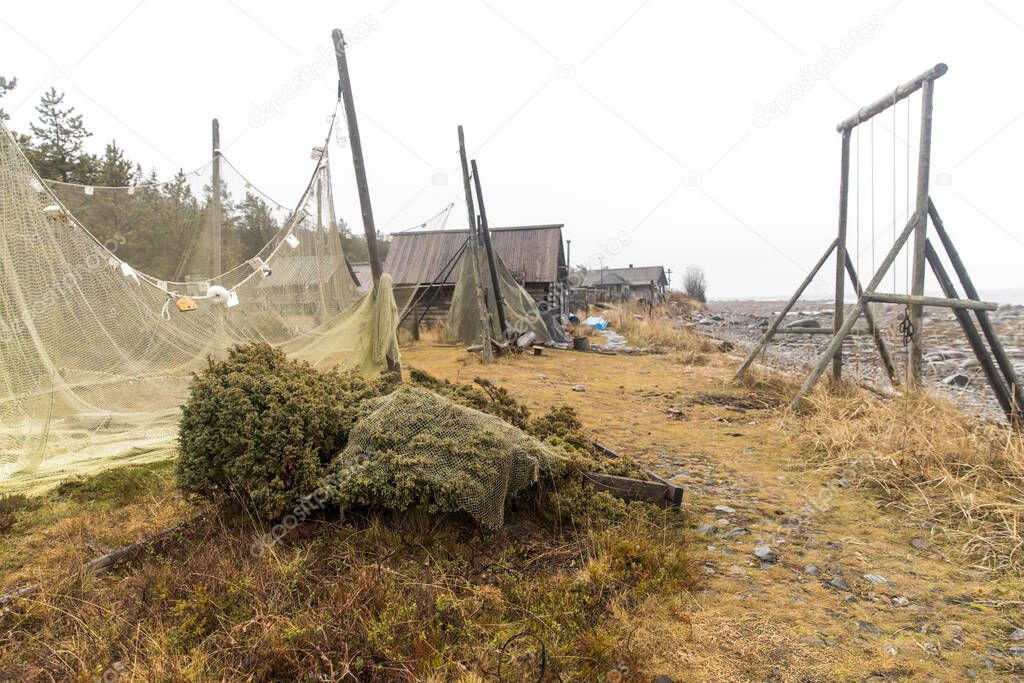 Kola Peninsula, Russia, November, 2021. Russian scene; Tersky coast of the White sea. Historical and Ethnographic Complex Tony Tetrina is a atmospheric location. The reconstructed village of Pomors.
