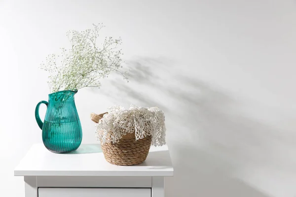 Large Glass Green Jug Bouquet Gypsophila Wicker Basket White Knitted — Stock Photo, Image