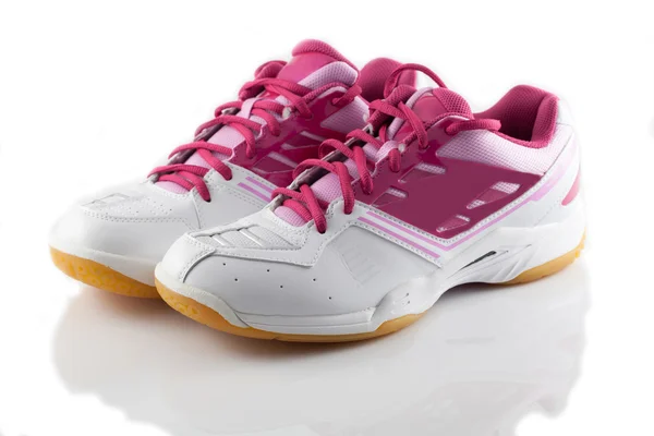 Chaussures de badminton sur couleur rose — Photo