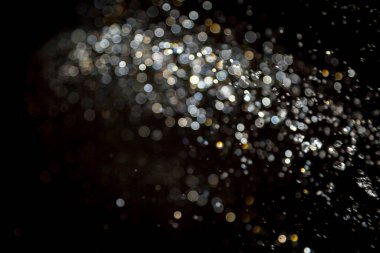 siyah arka plan üzerinde renkli bokeh