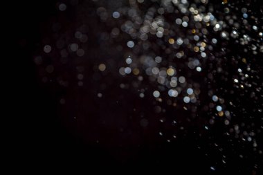 siyah arka plan üzerinde renkli bokeh