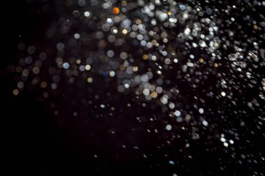 siyah arka plan üzerinde renkli bokeh