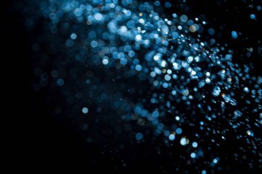 siyah arka plan üzerinde renkli bokeh