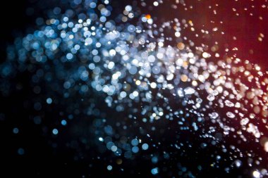 siyah arka plan üzerinde renkli bokeh