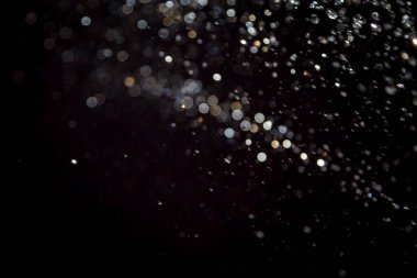 siyah arka plan üzerinde renkli bokeh