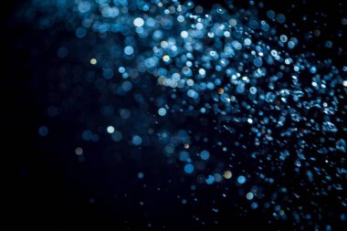 siyah arka plan üzerinde renkli bokeh