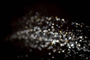 siyah arka plan üzerinde renkli bokeh