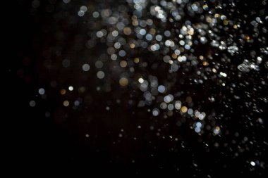 siyah arka plan üzerinde renkli bokeh