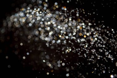 siyah arka plan üzerinde renkli bokeh