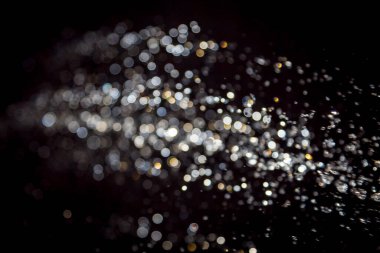 siyah arka plan üzerinde renkli bokeh