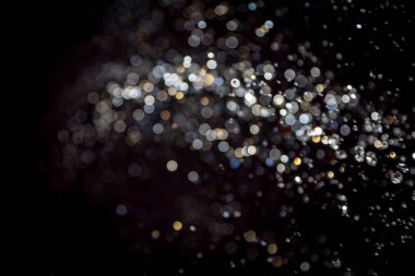 siyah arka plan üzerinde renkli bokeh