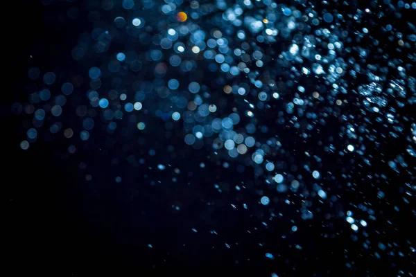 siyah arka plan üzerinde renkli bokeh