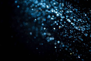 siyah arka plan üzerinde renkli bokeh