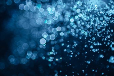 açık arkaplanlı mavi bokeh suyu