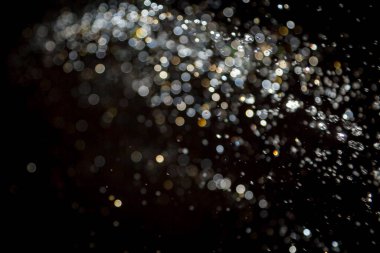 siyah arka plan üzerinde renkli bokeh