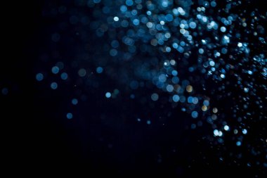 siyah arka plan üzerinde renkli bokeh