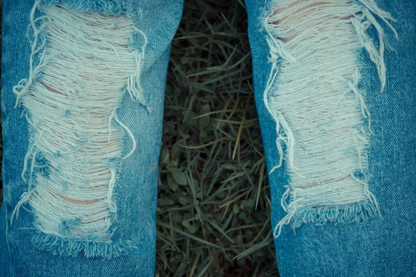 Vrouwelijke Gescheurde Jeans Achtergrond — Stockfoto