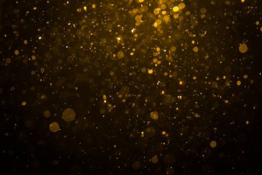 Siyah arkaplan ile soyut altın bokeh