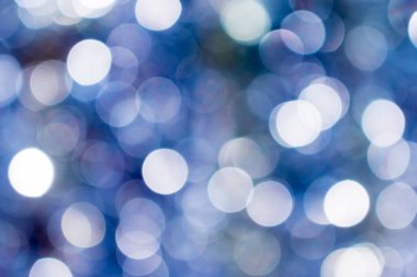 Yanıp sönen ışıklar bulanık Bokeh arkaplan ile odaklanmış soyut Parlatıcı