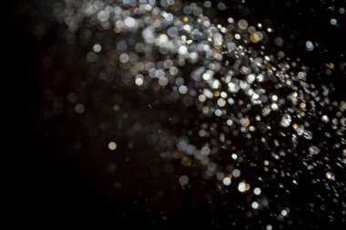 siyah arka plan üzerinde renkli bokeh