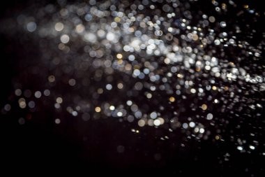 siyah arka plan üzerinde renkli bokeh