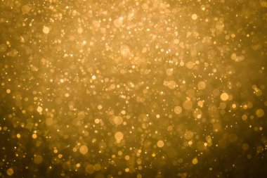 Siyah arkaplan ile soyut altın bokeh